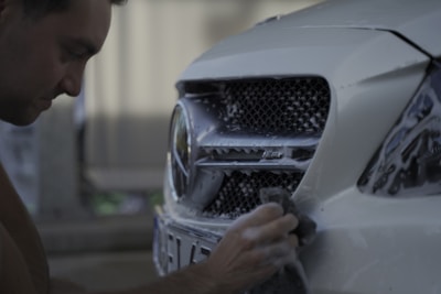 a person looking at a car