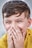 a person covering the face with the hands