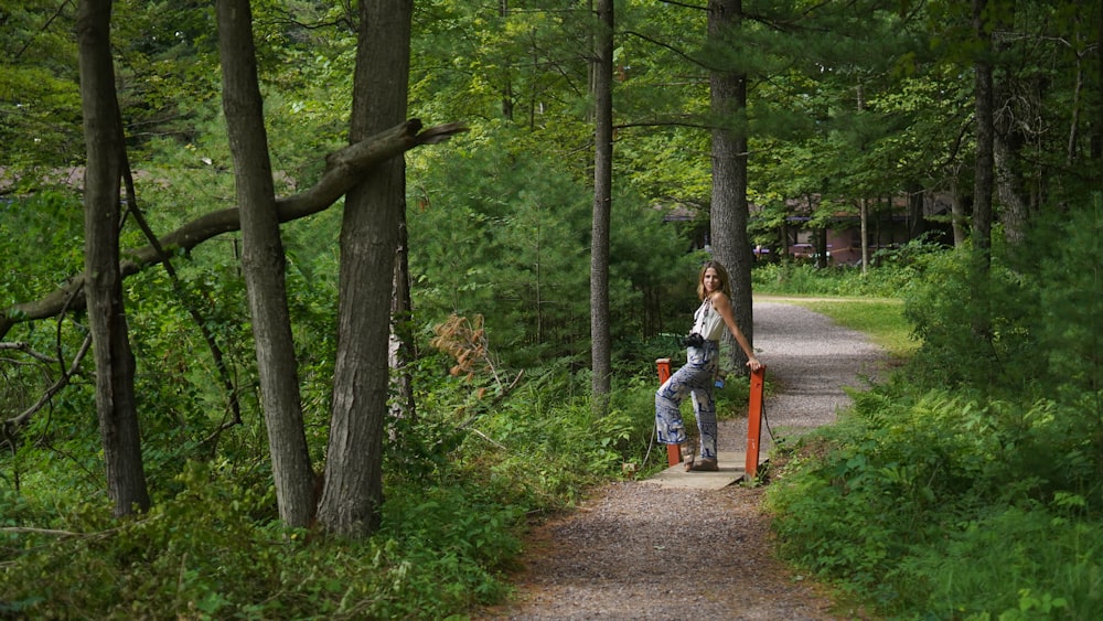 a man stands on a path