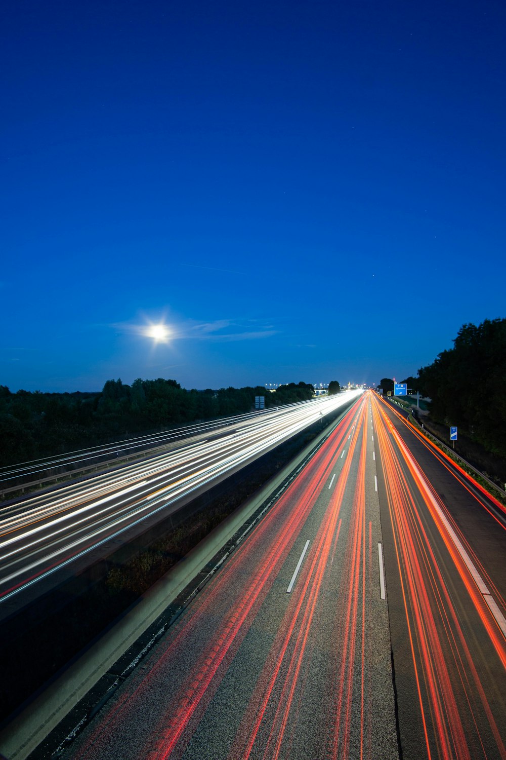 a highway with red lights