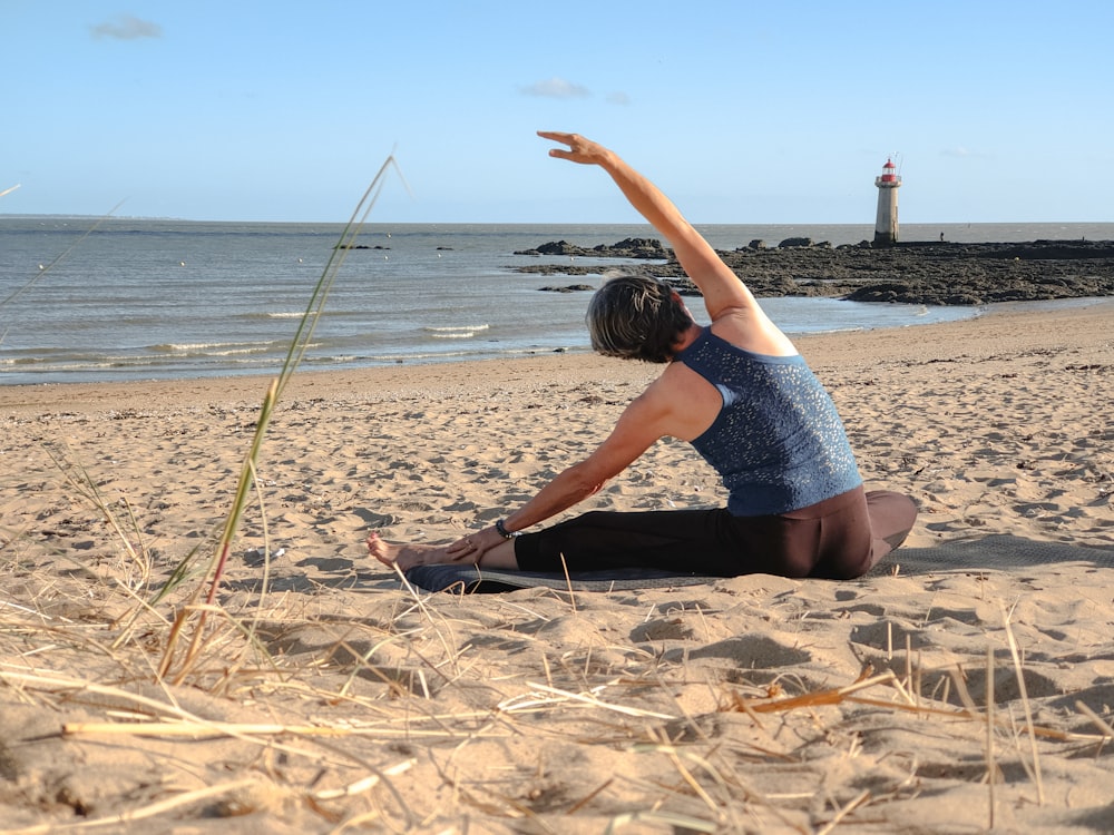 a person sitting on a beach