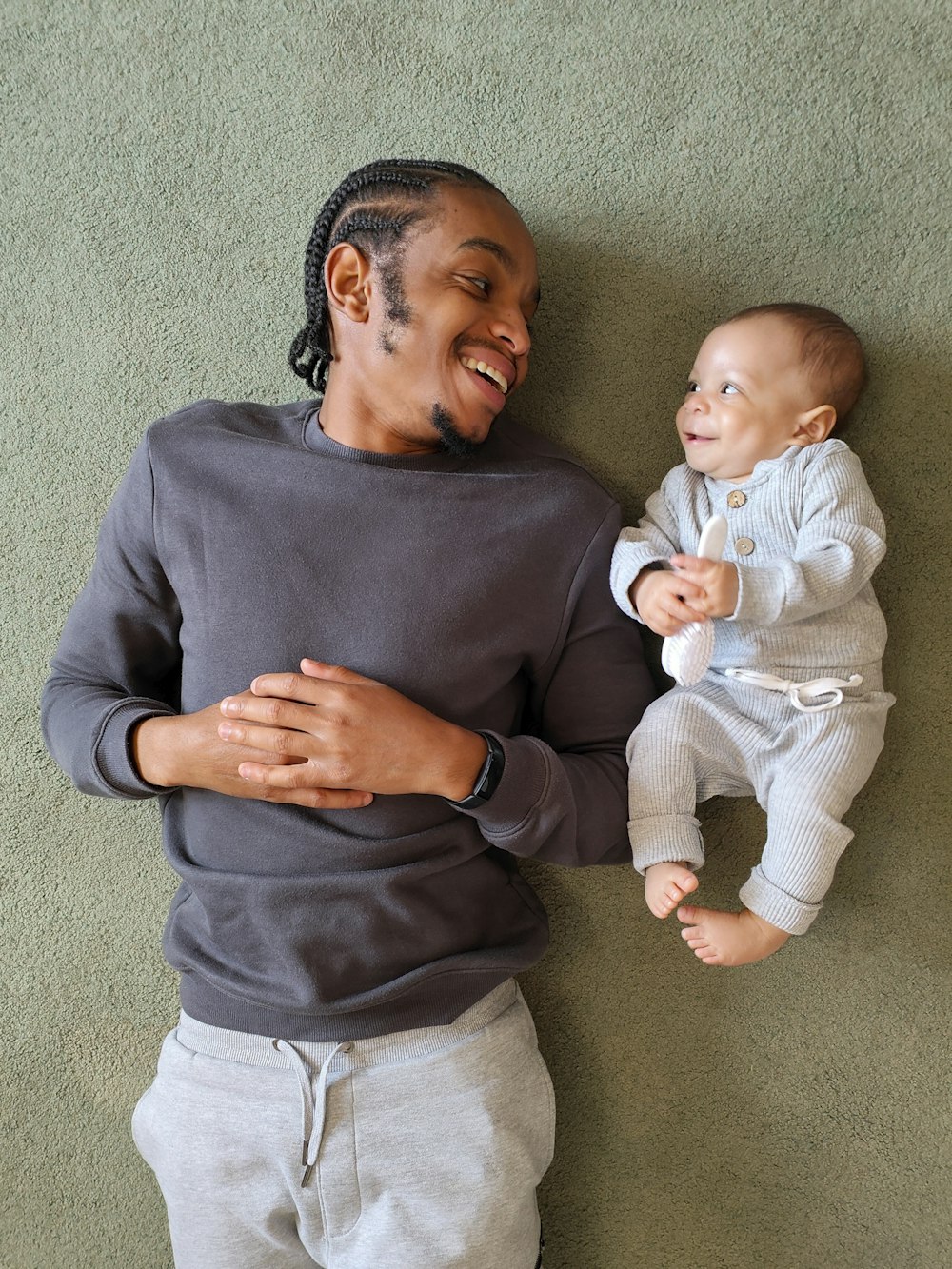 a person holding a baby