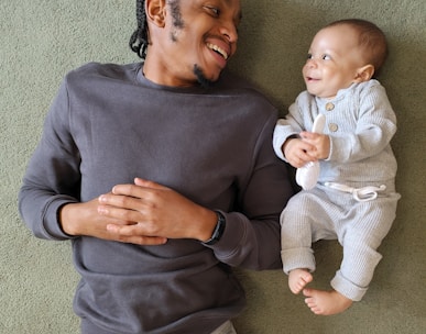 a person holding a baby