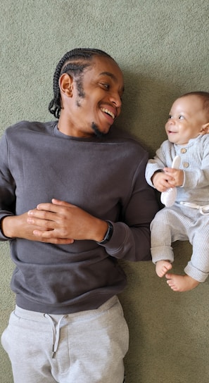 a person holding a baby