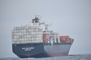 a large ship with containers on it
