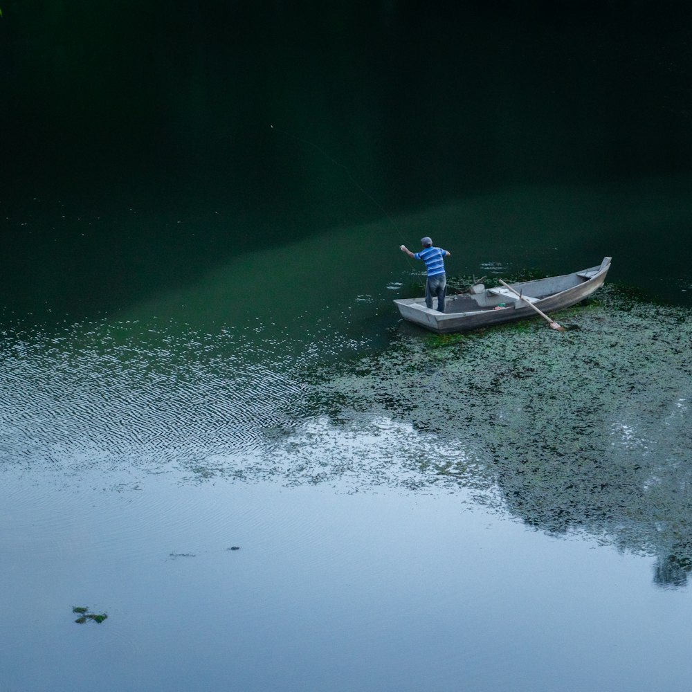 a man rowing a boat