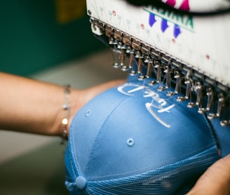 a person holding a blue object