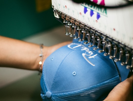 a person holding a blue object