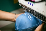 a person holding a blue object