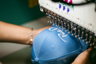 a person holding a blue object