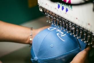 a person holding a blue object