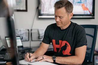 a man sitting at a desk