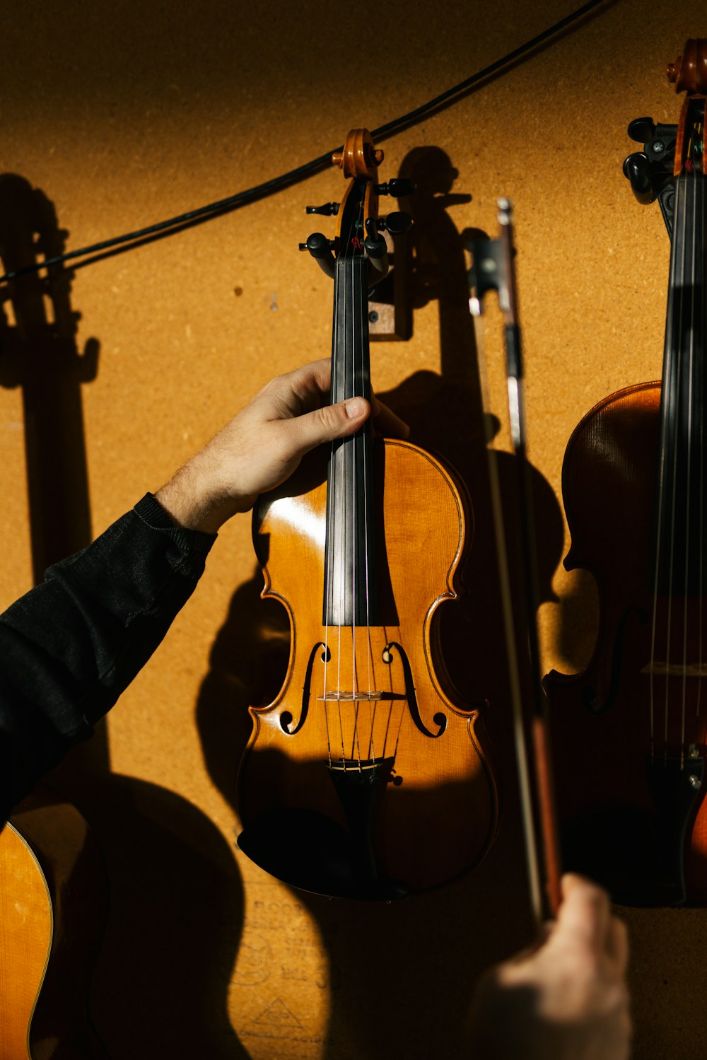 a person playing a violin