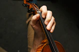 a person playing a violin