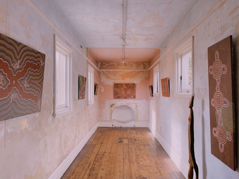 a hallway with art on the walls