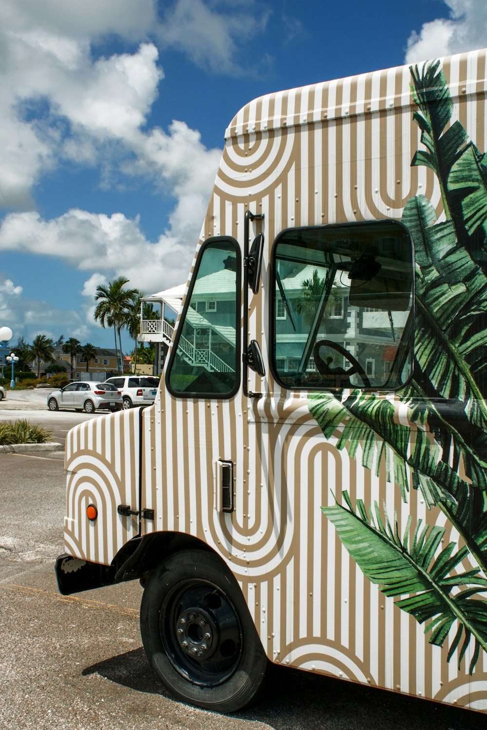 a van with a plant painted on it