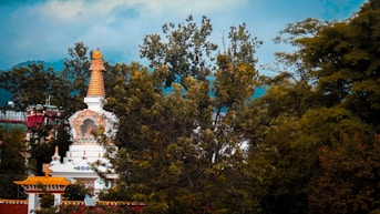a temple with trees around it