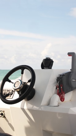 a steering wheel and a steering wheel on a boat