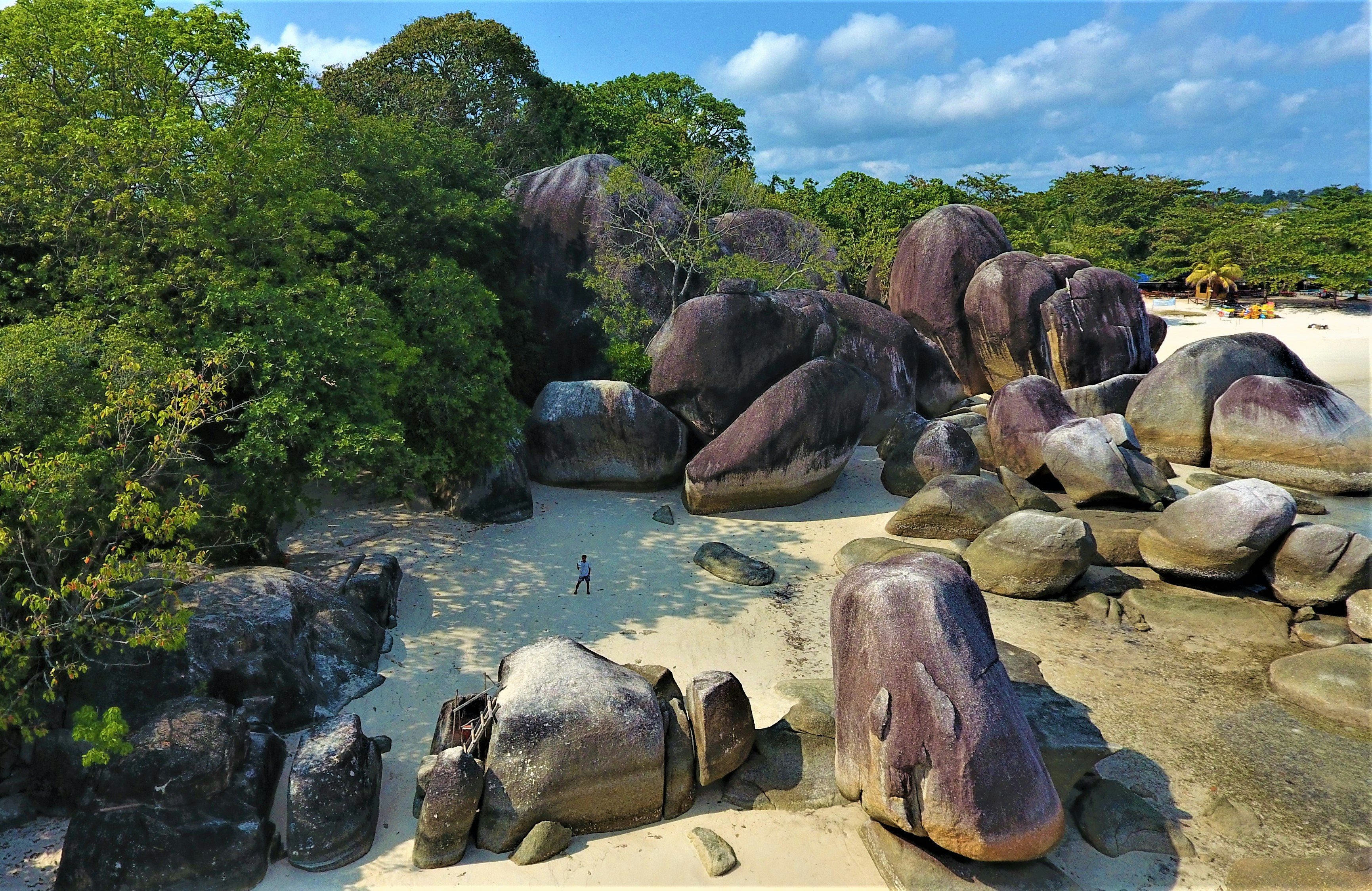 a group of rocks in a pond