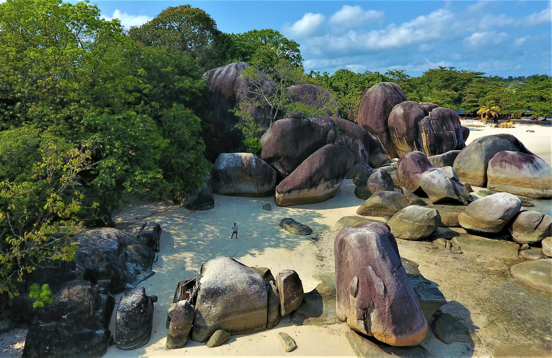 a group of rocks in a pond