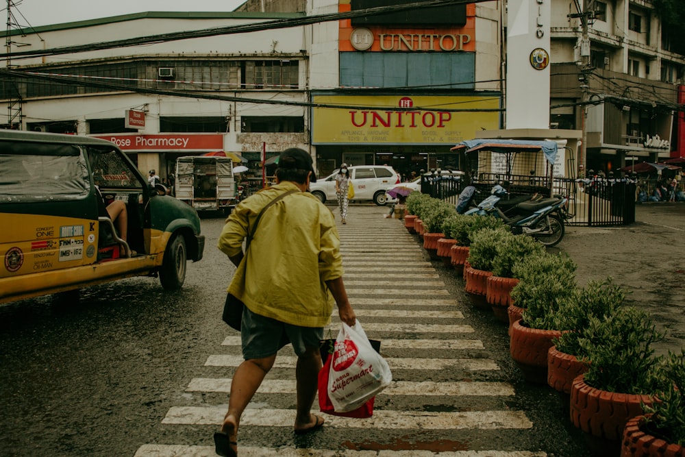 a person walking down a sidewalk