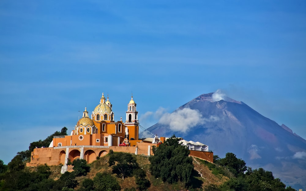 a large building on a hill