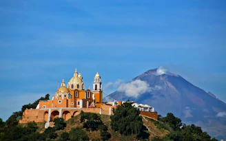 a large building on a hill