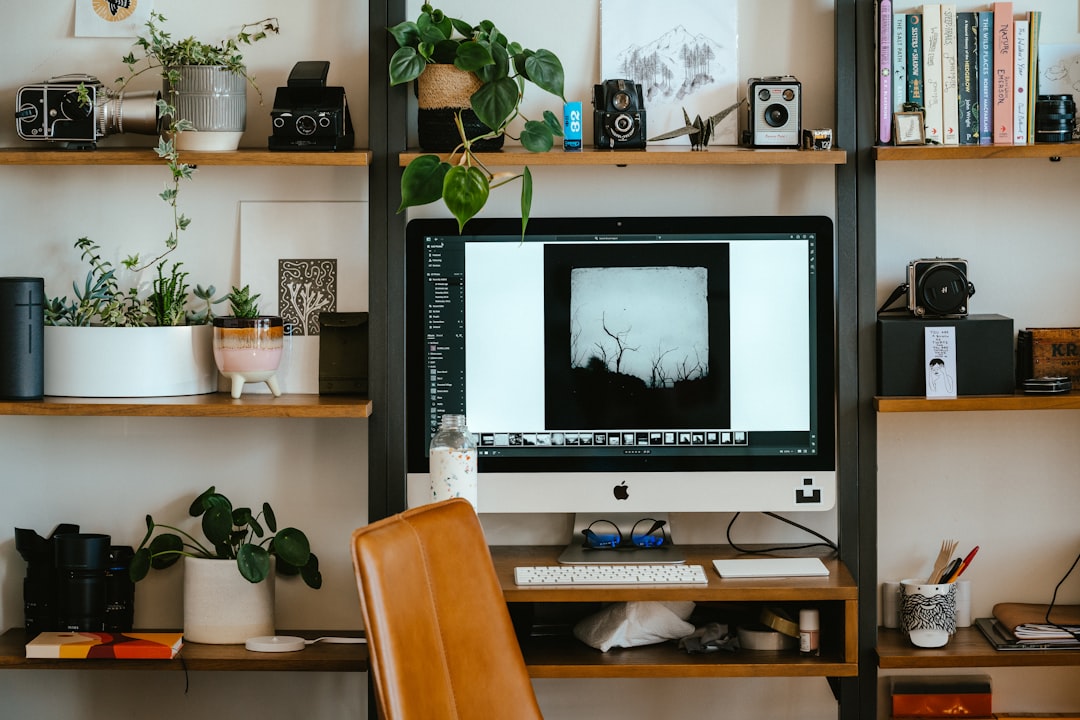 a computer on a desk,