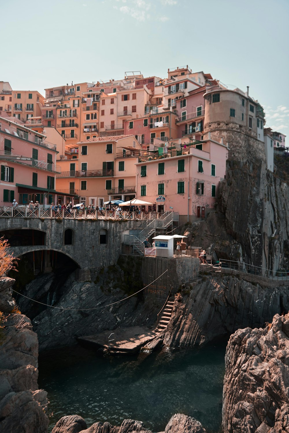 a bridge over a river with buildings on either side of it