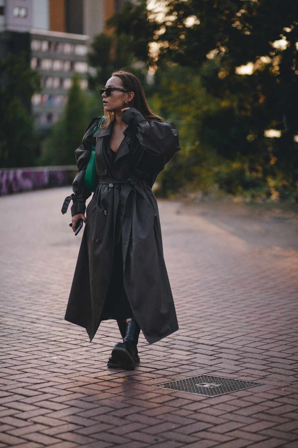 a woman in a trench coat