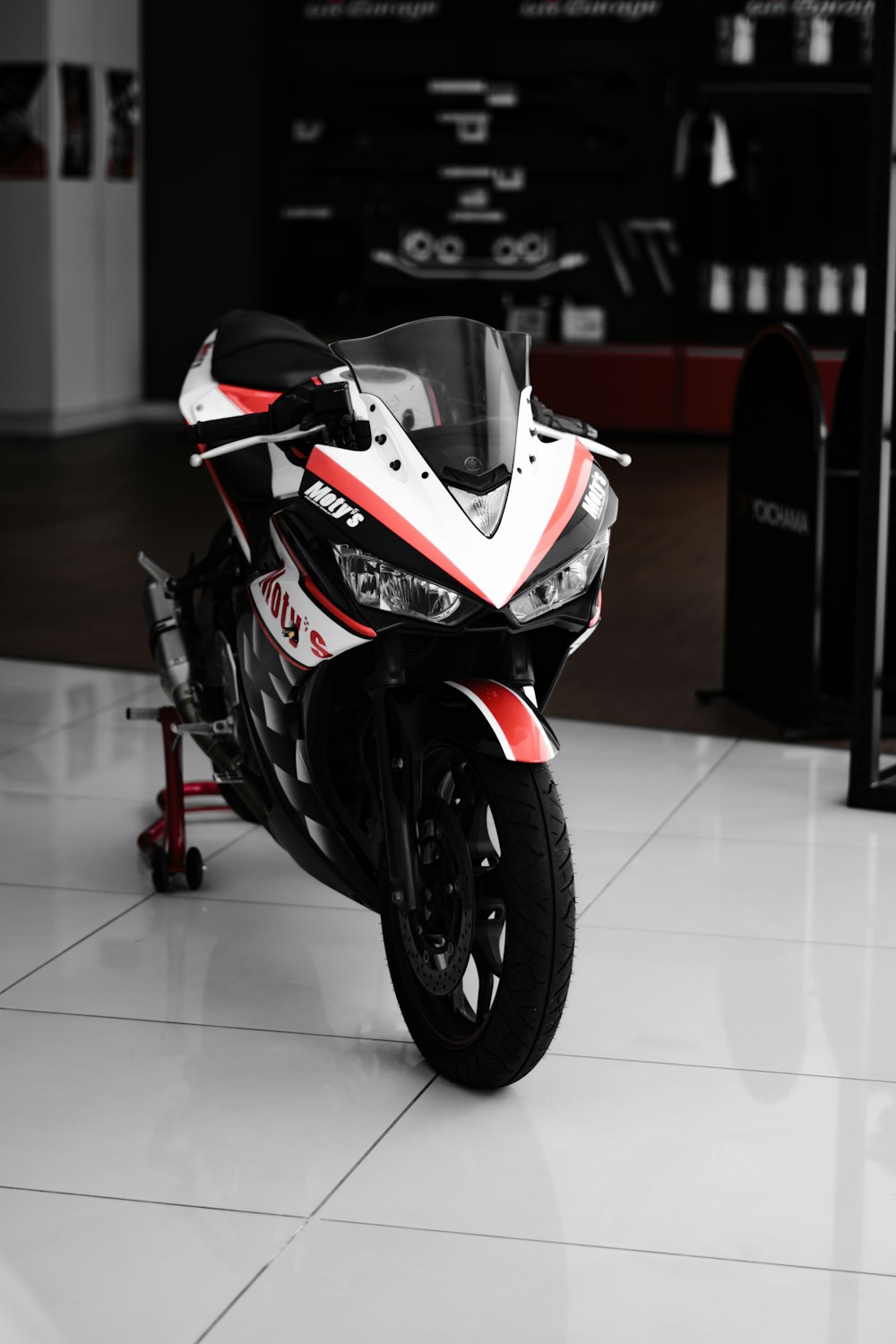 a motorcycle parked in a showroom