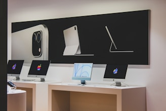 a desk with a computer and a monitor on it