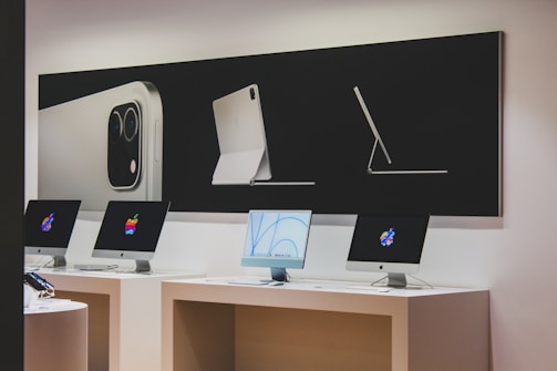 a desk with a computer and a monitor on it
