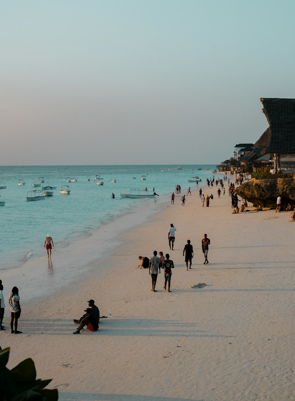 a group of people on a beach