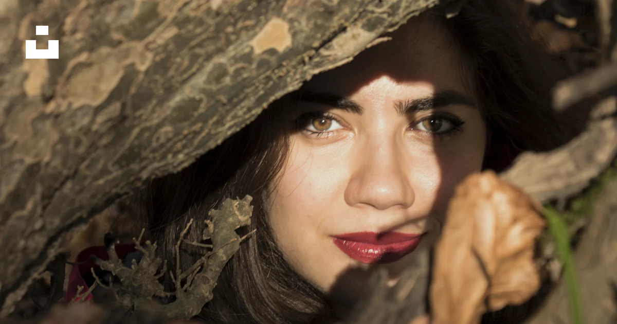 Person Looking Under Rocks A person looking out of a hole in a rock photo – Free Astara Image on ...