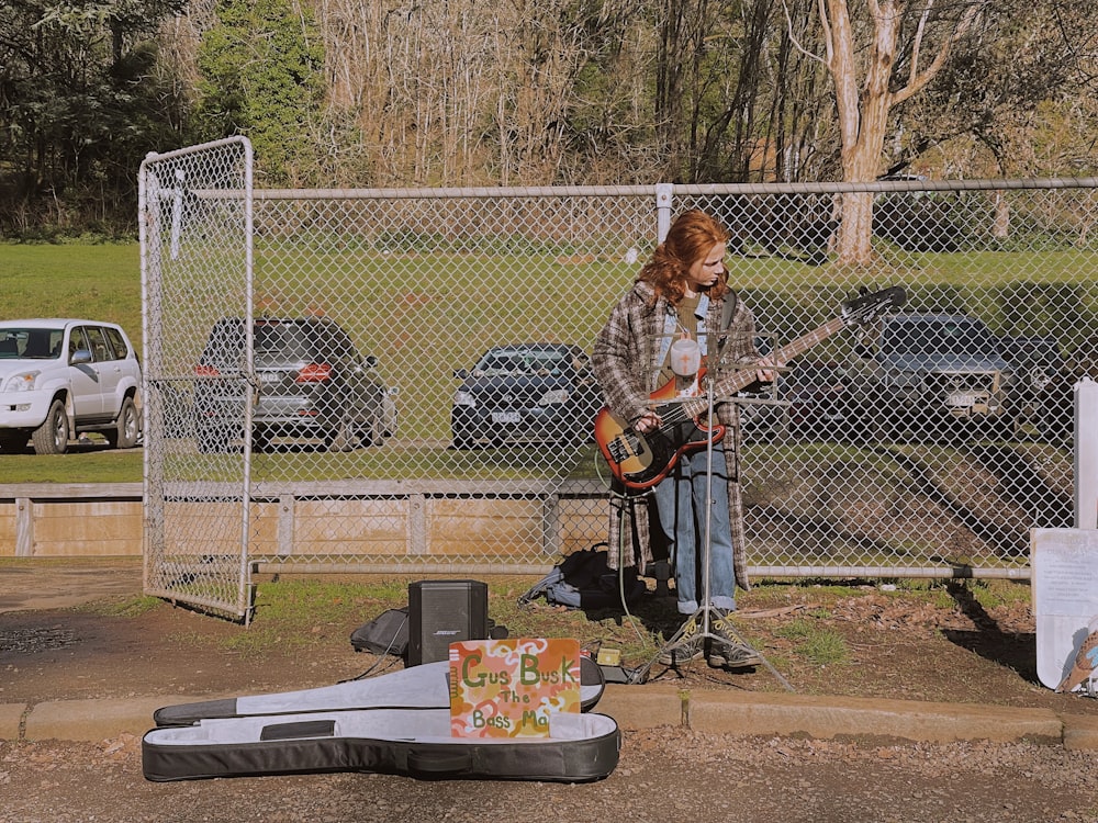 a person playing a guitar