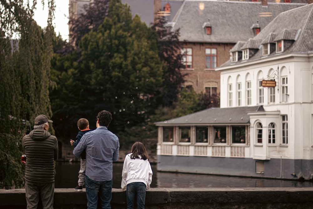 a group of people standing in front of a building