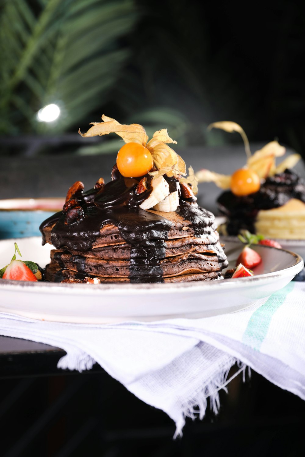 a chocolate cake with chocolate frosting