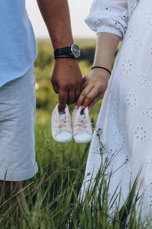 a man and woman holding hands