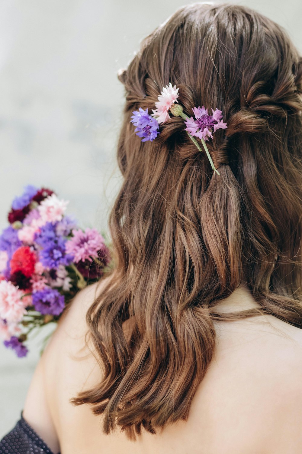 a woman with flowers in her hair