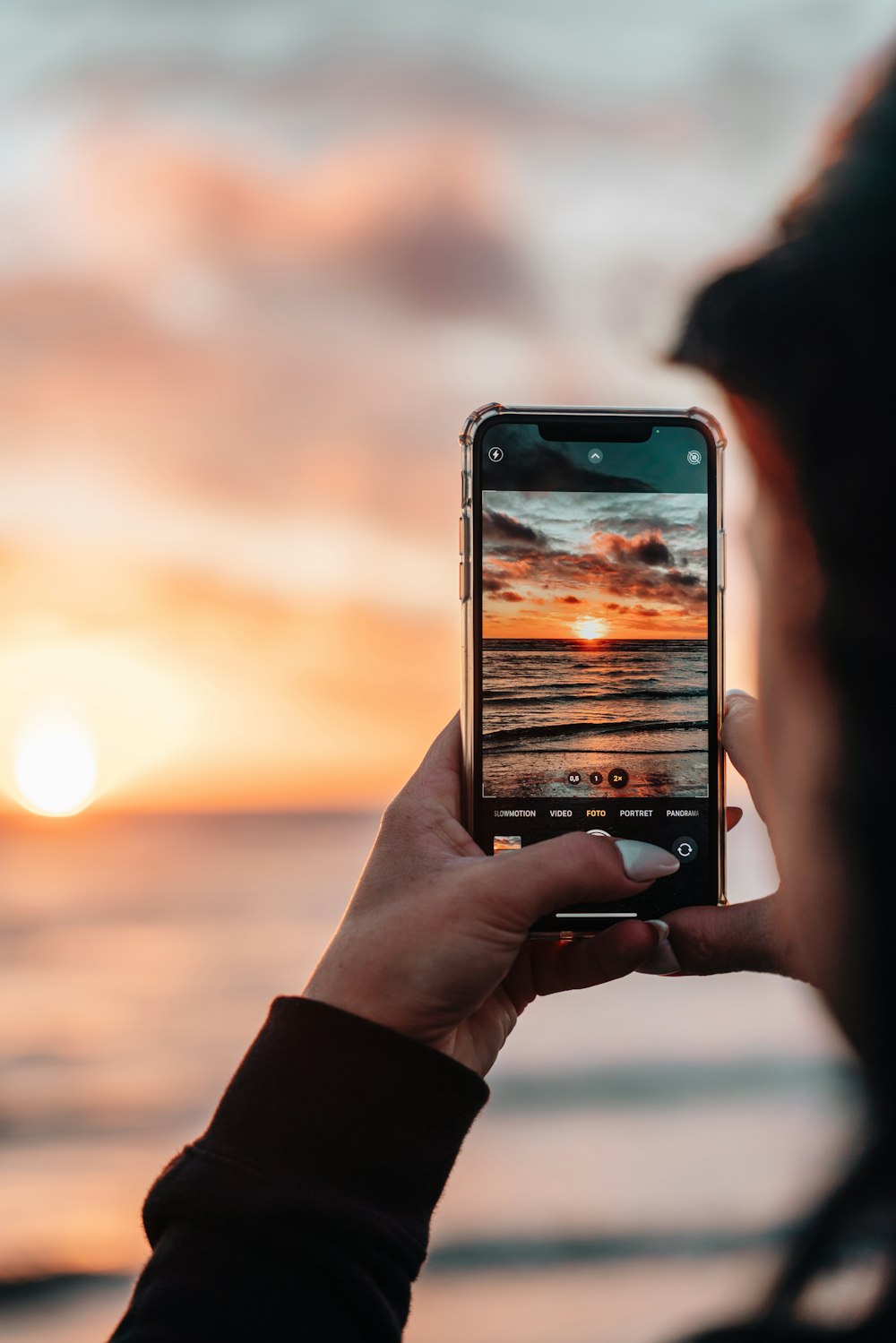 a person holding a cell phone