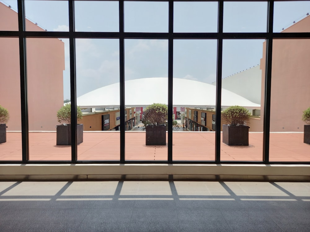 a view of a street through a window of a building