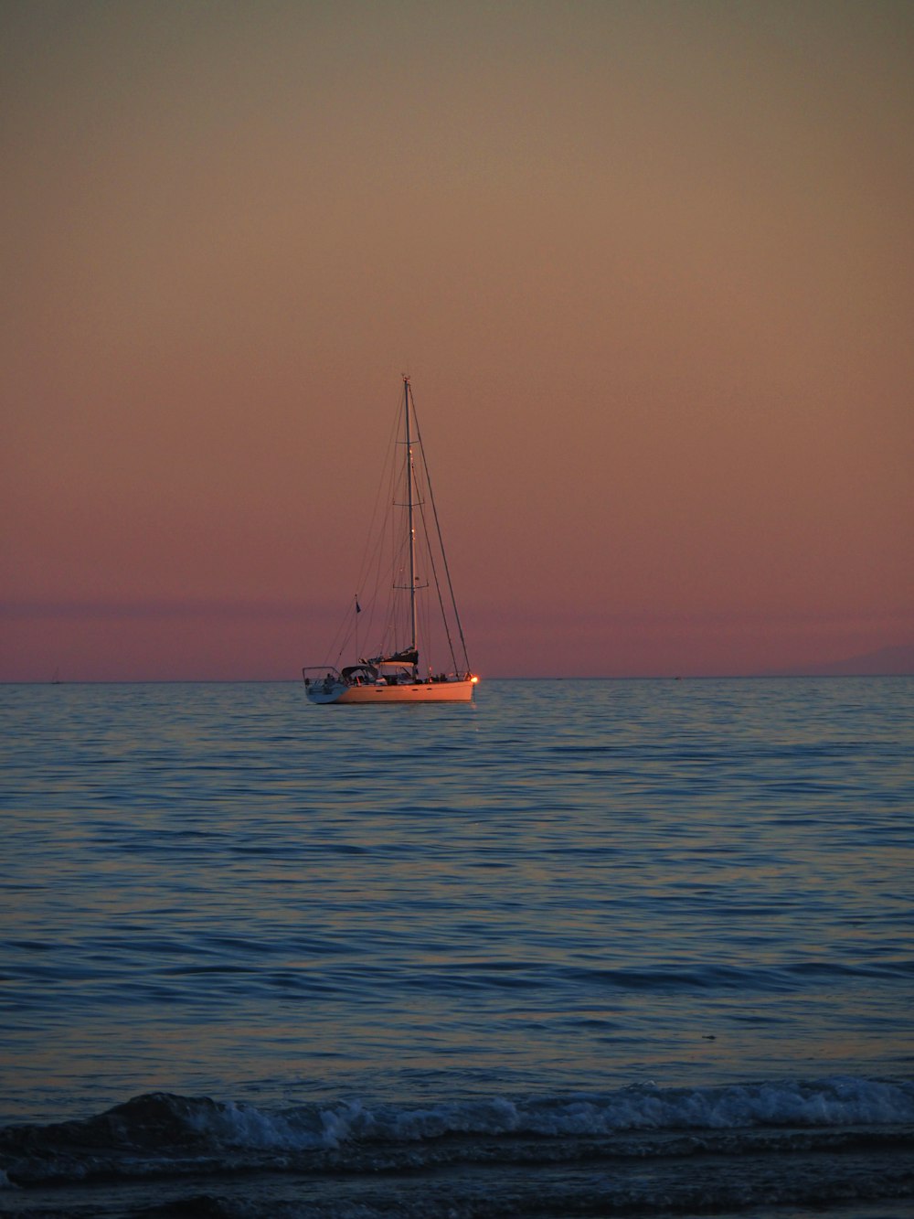 a boat sailing in the sea