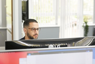 a man sitting at a desk