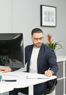 a man sitting at a desk