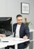 a man sitting at a desk