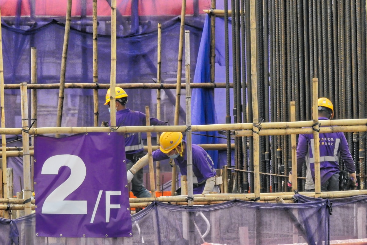 Construction workers at a job site representing American workers earning real wage gains above inflation