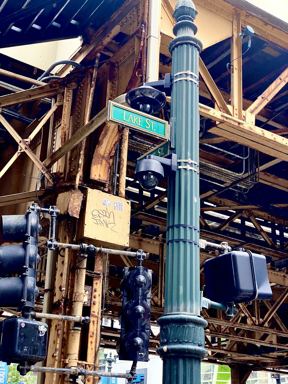 a street sign is posted on a pole