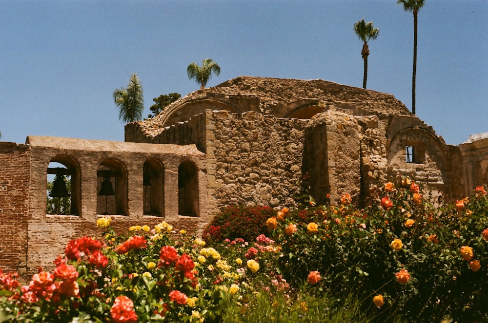 a building with flowers in front of it