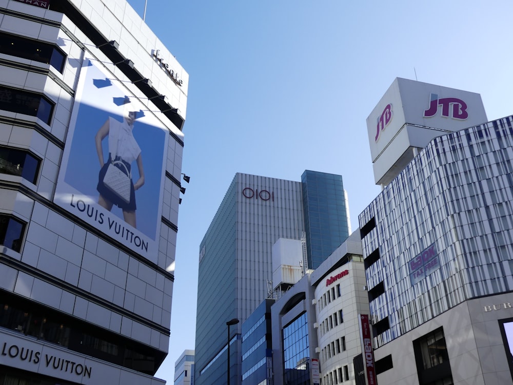 a group of buildings with signs